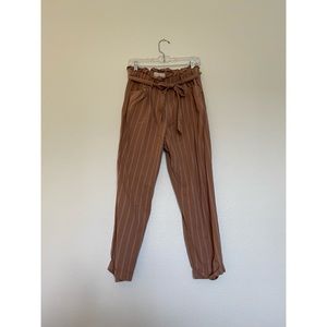 Paper bag style tan striped trousers
